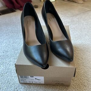 Clark’s black leather heels